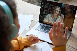 Student connecting with a friend online